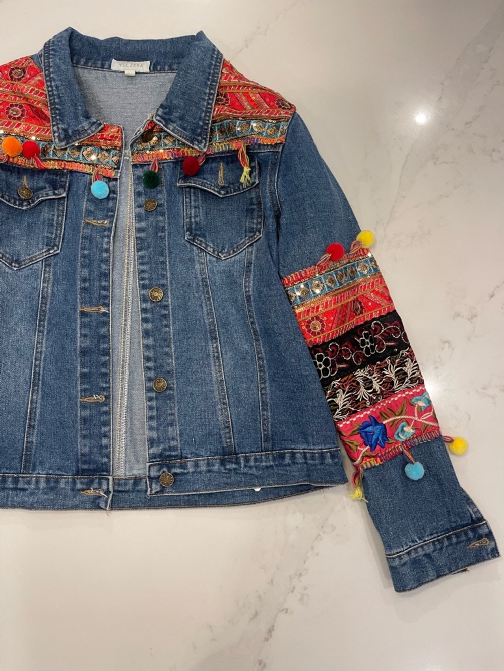 Velzera Women’s Denim Jacket with Multicolor Embroidered Panels and Pom-Poms - Picture 2 of 16